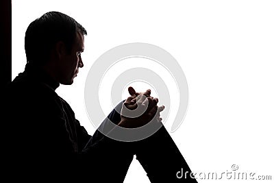 Young man with grief dropped his arms Stock Photo