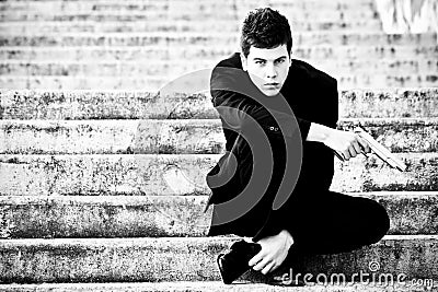 Young man with a gun Stock Photo