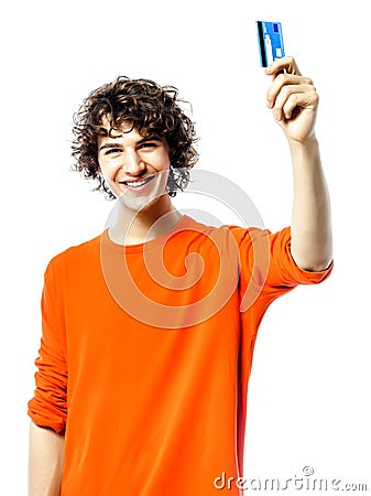 Young man happy holding credit card portrait Stock Photo