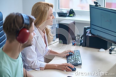 Young man having an appointment at otolaryngologists office Stock Photo