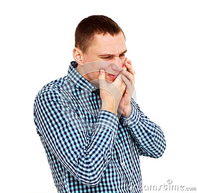 Young man having teeth pain. Isolated on white Stock Photo