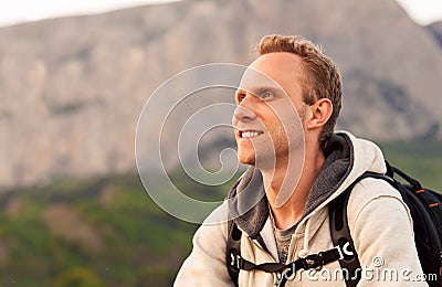 Young man height enjoy after climbing on the mount Stock Photo