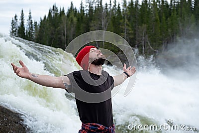 Young Man hiking outdoor Lifestyle Travel survival concept river and rocky mountains on background Stock Photo