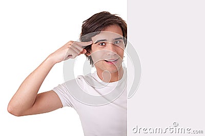 Young man holding a blank billboard,gesturing have Stock Photo