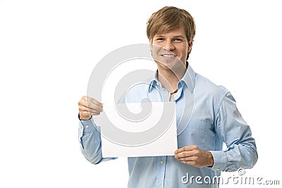 Young man holding blank sheet Stock Photo