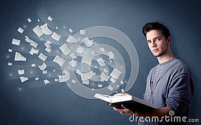 Young man holding book Stock Photo