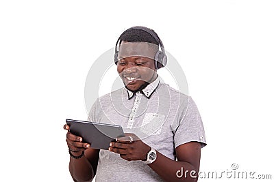 Young man holding digital tablet smiling Stock Photo