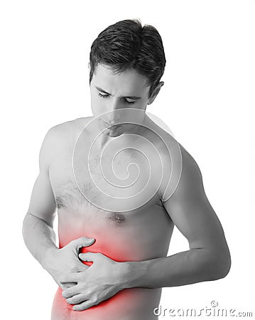 Young man holding his sick stomach in pain Stock Photo