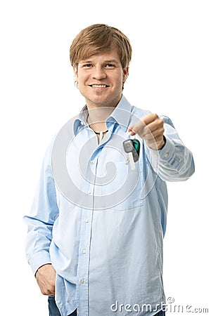 Young man holding ignition keys Stock Photo