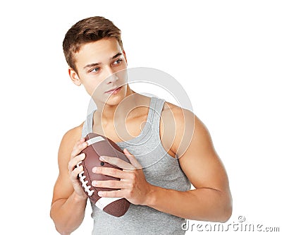 Young man holding rugby ball Stock Photo