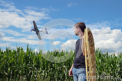 A young man holds the wing ribs. Stock Photo