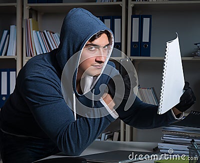 The young man in industrial espionage concept Stock Photo