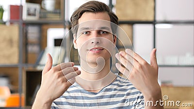 young man inviting Talented People to Come and Join Stock Photo