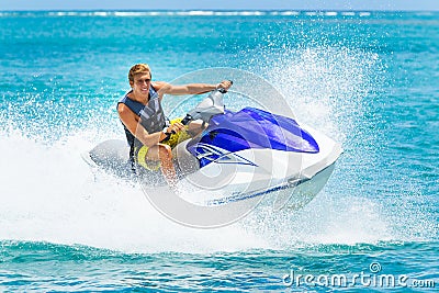 Young Man on Jet Ski Stock Photo