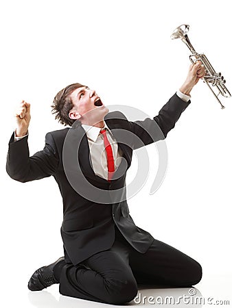 Young man joy, glee and his Trumpet Stock Photo