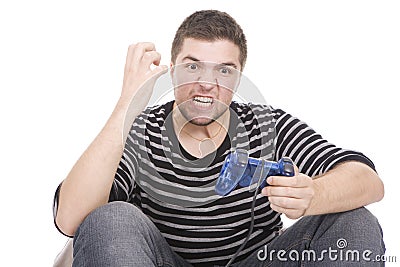 Young man with joystick and angry Stock Photo