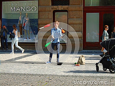 The young man juggling in the street. Prague, Editorial Stock Photo