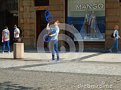 The young man juggling in the street. Prague, Editorial Stock Photo
