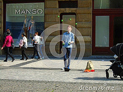 The young man juggling in the street. Prague, Editorial Stock Photo