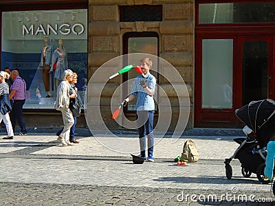 The young man juggling in the street. Prague, Editorial Stock Photo