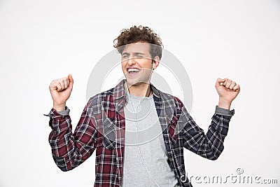 Young man listening the music in headphones Stock Photo