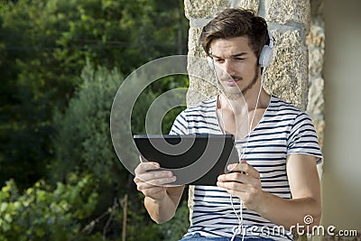 Young man listening music Stock Photo