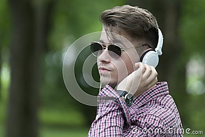 Young man listens to music Stock Photo