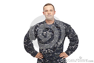 Young man in navy uniform with hands on hips Stock Photo