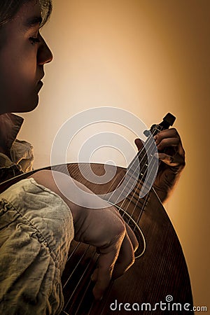 Young Man with Old Oud Guitar Lute Stock Photo