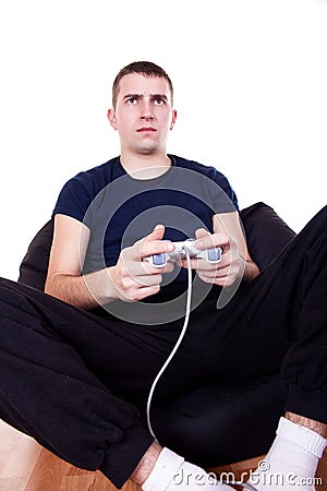 Young man playing computer game Stock Photo