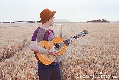 Young man playing guitar, romantic music love song Stock Photo