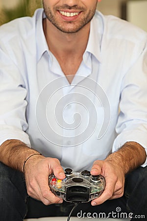 Young man playing video games Stock Photo