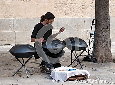 Young man plays drums in Granada, Andalusia, Spain, Espana Editorial Stock Photo