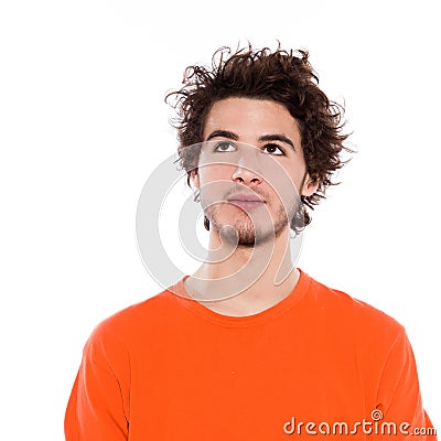 Young man portrait serious looking up Stock Photo