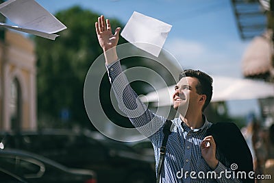 Young man quit job. Happy businessman Stock Photo