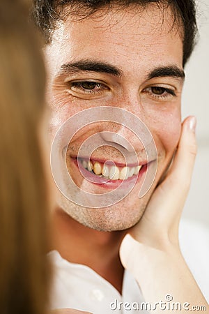 Young man receving caress Stock Photo