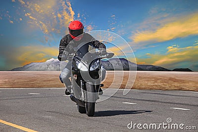 young man riding motorcycle in asphalt road curve use for extreme sport leisure Stock Photo