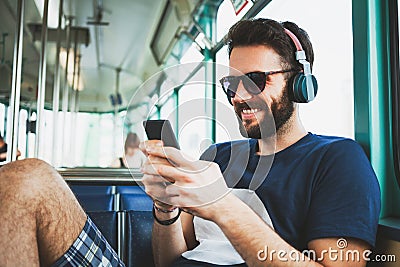 Young man riding in public transport Stock Photo