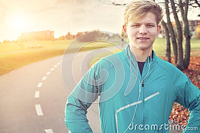 Young man runner portrait before starting Stock Photo