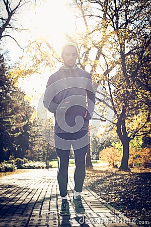 Young man running. Sporty man jogging. Stock Photo