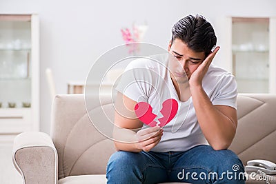 The young man in sad saint valentine concept Stock Photo