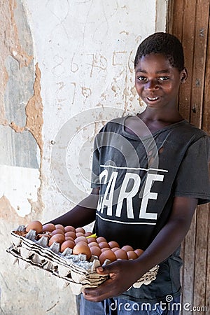 Young man selling boiled eggs Editorial Stock Photo