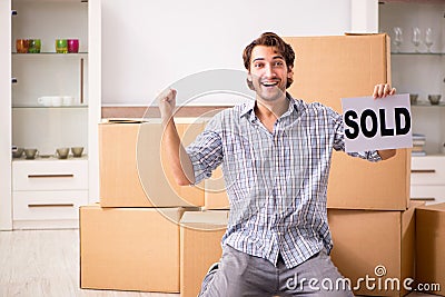 The young man selling his house Stock Photo