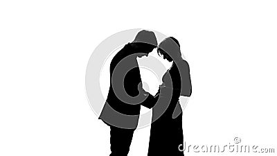 Young man shadow hugging pregnant wife belly, expecting couple, happy parenthood Stock Photo