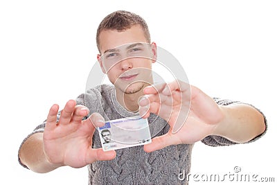 Young man showing his driver license Stock Photo