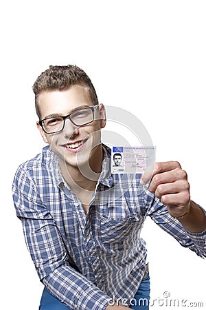 Young man showing off his driver license Stock Photo