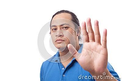 Young Man Shows Stop Sign Stock Photo