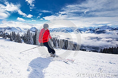 Young man skiing in Kitzbuehel ski resort, Tyrol, Austria Stock Photo