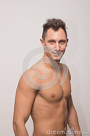 Young man smirk, upper body, side view, model polaroid snapshot Stock Photo