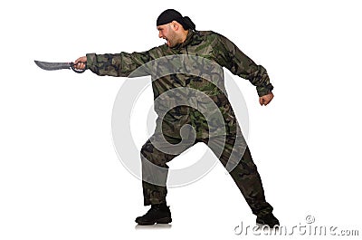 Young man in soldier uniform holding knife Stock Photo